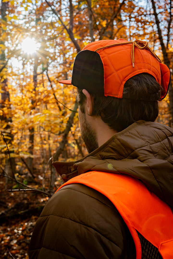 What I wear: leather jacket and trapper hat